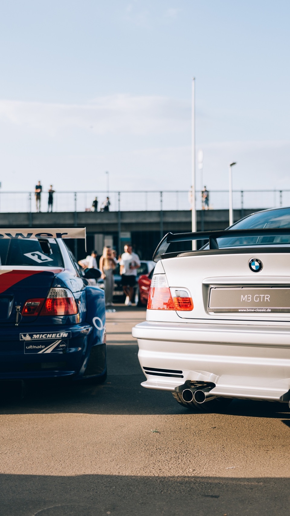 2 BMW GTR, one road-legal, one a race car version.