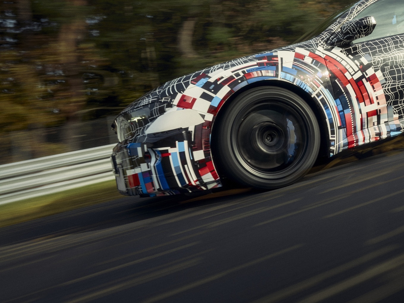 Alloy wheel of the BMW M all-electric protoype during a high-speed ride at the Nürburgring.